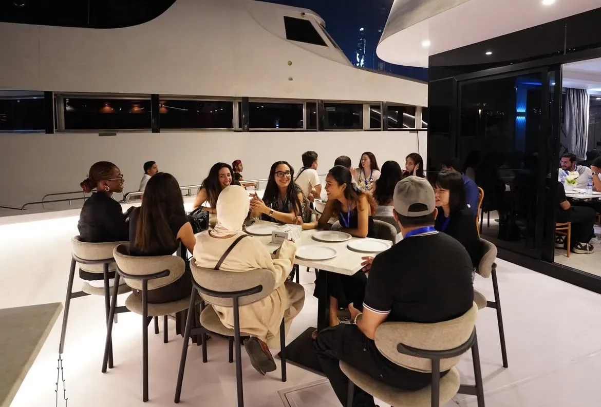 Networking dinner on the water at night